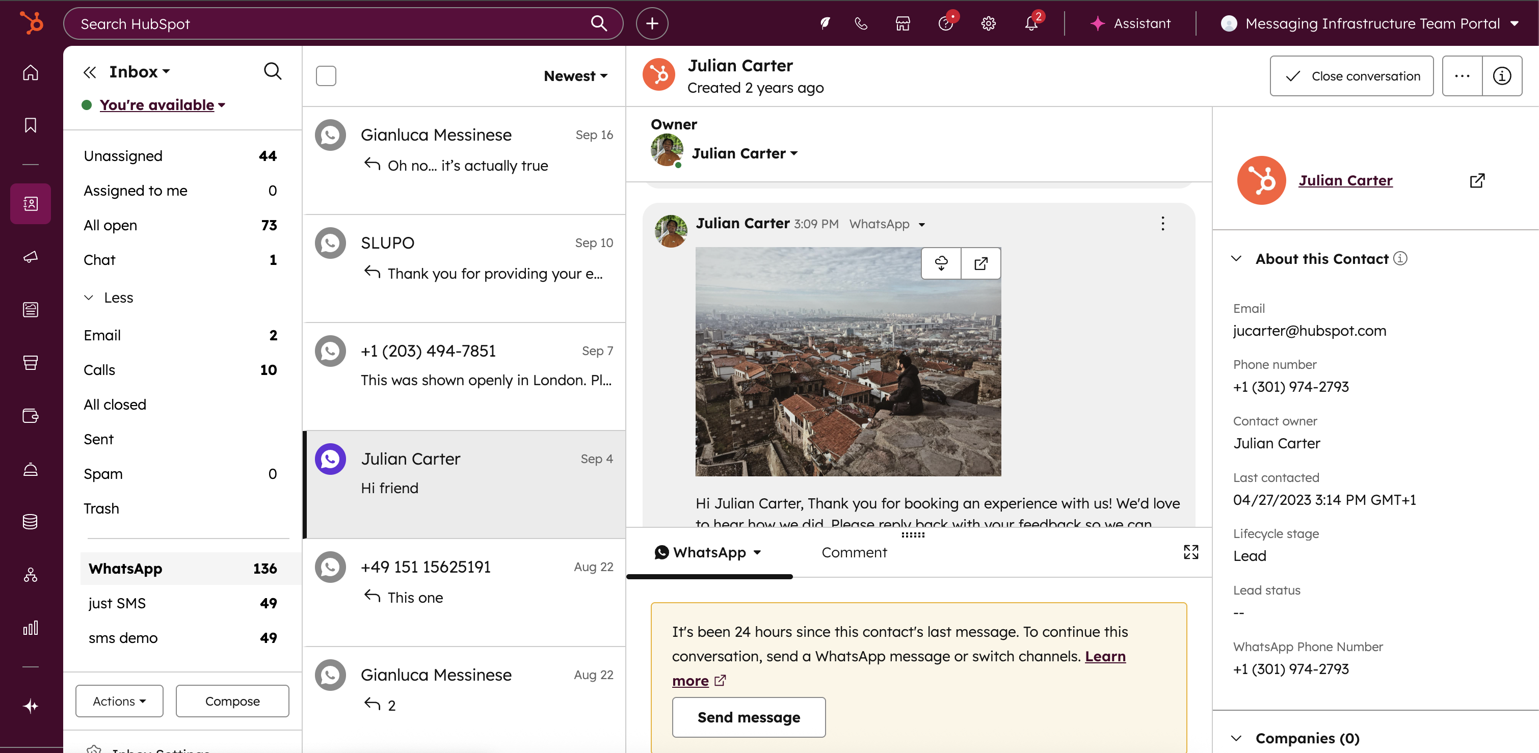 Screenshot of HubSpot inbox showing WhatsApp conversation management and contact details.